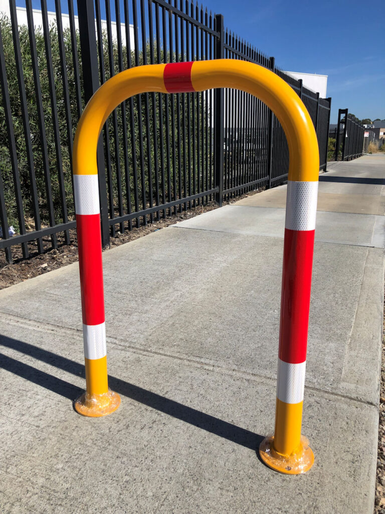 Steel hand rails with yellow and red safety finish installed in Perth